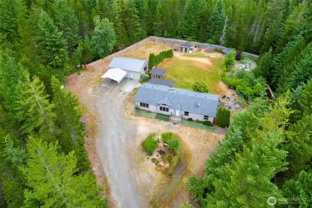 Your peaceful 5-acre retreat surrounded by nature, complete with a spacious home, shop, and endless possibilities!