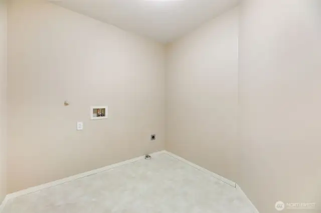 Large upstairs laundry room.