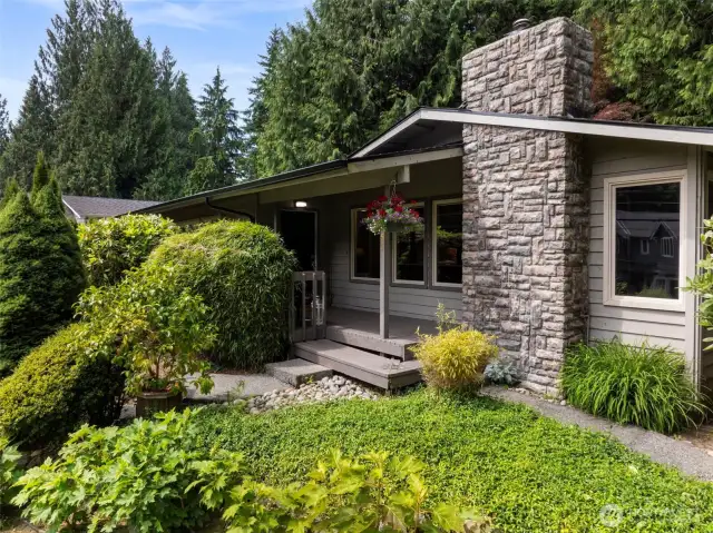 Covered front porch for privacy and those inclement weather days!
