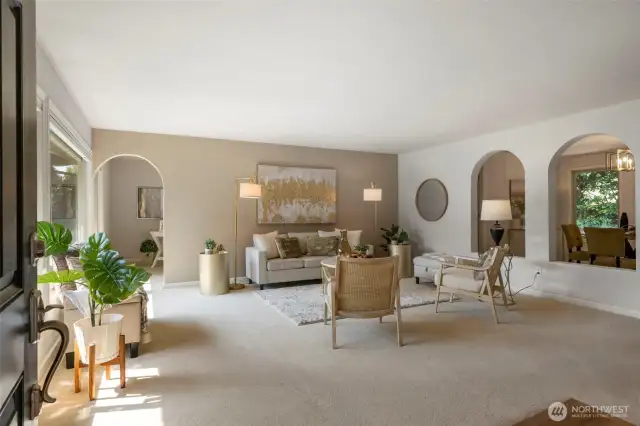 The living room has large windows and easily brings in lots of light!