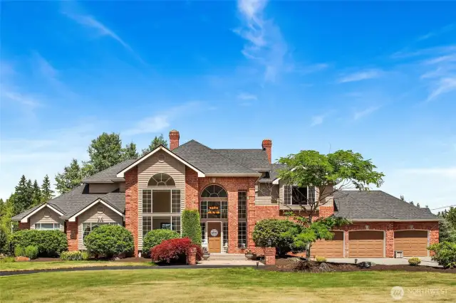 Welcome to your Luxury country estate on 2.5 acres, with wrap around paved driveway.