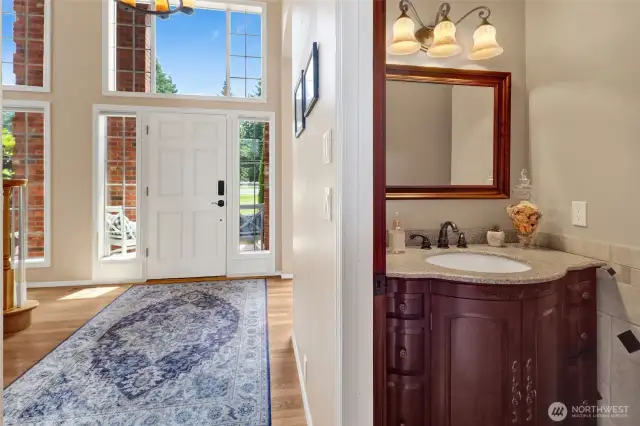 Main entryway foyer, with half bath pictured.