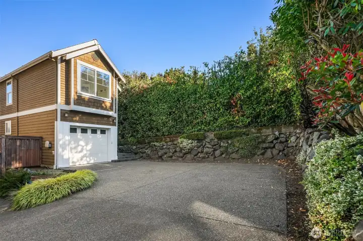 One car garage + parking off street for 2 cars.