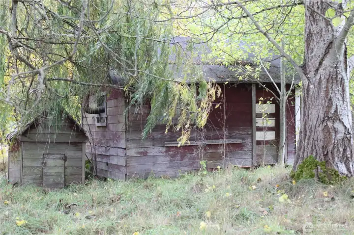 Old shed where farm workers lived in early 1900's and pump house