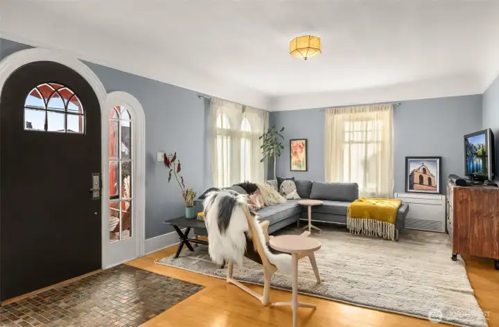 Flooded with natural light, highlighting the pristine bamboo hardwoods and airy layout