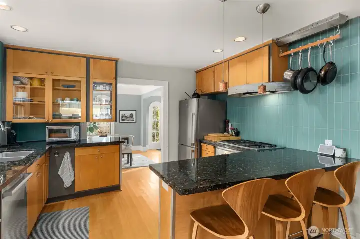 A chef’s delight— with sleek granite, stainless steel, and a layout that flows for entertaining