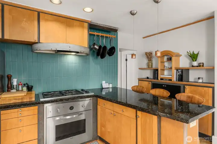 Details matter: custom cabinetry and artisan tile work elevate every meal prep