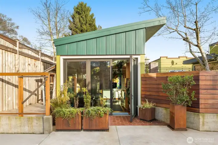 Outside - a luxury studio awaits - connected to the driveway and back courtyard