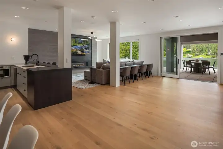 The lower level features a rec room/bar, gym & sauna.