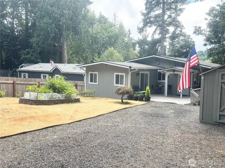 Home and shed are in amazing condition! The property is well-maintained, showcasing both the house and the outbuilding in excellent repair and presentation.