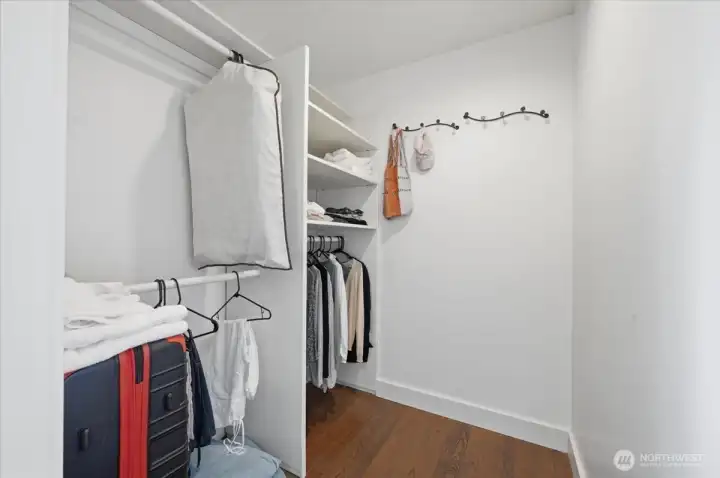 Walk-in closet in the primary suite.