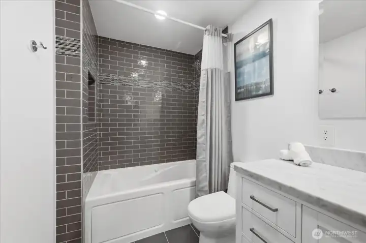Renovated guest bath on the upper level.