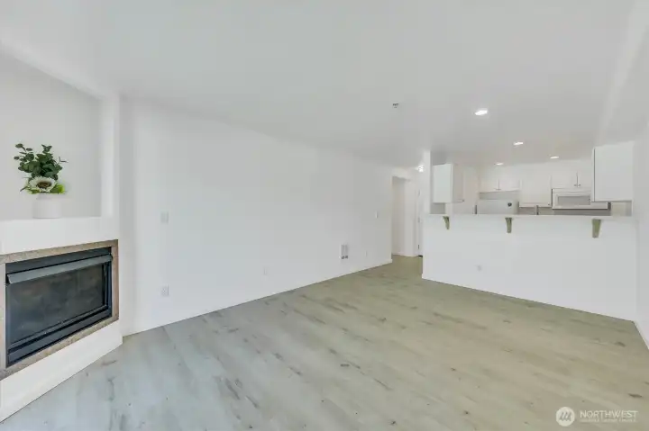 New kitchen countertops include a tasteful breakfast bar.