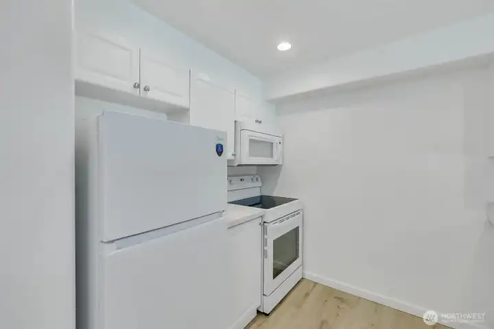 New fridge and stove/range.