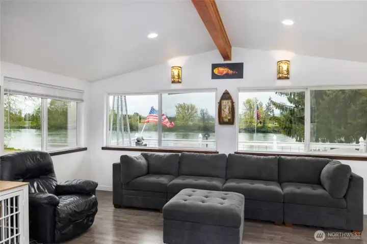 Large windows offer beautiful river views and lots of natural light. Large windows offer beautiful river views and lots of natural light.