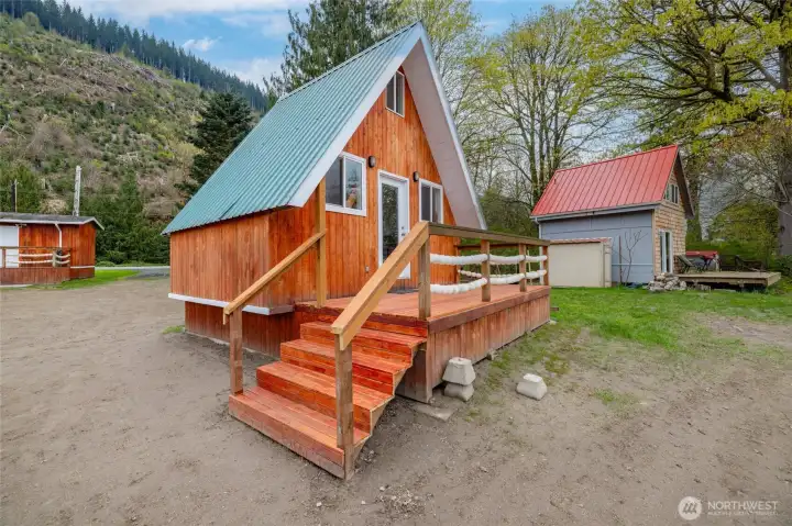 A-frame cabin with porch. A-frame cabin with porch.