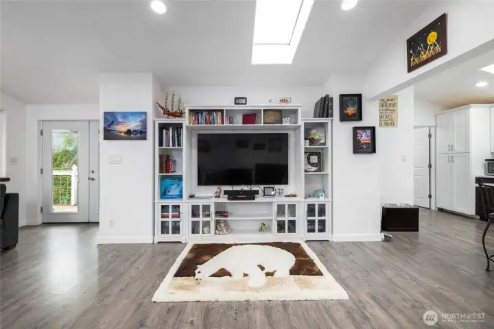 Living room offers built-in storage and lots of light. Living room offers built-in storage and lots of light.