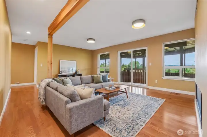 lower level bonus room/ 2nd living room Virtually staged