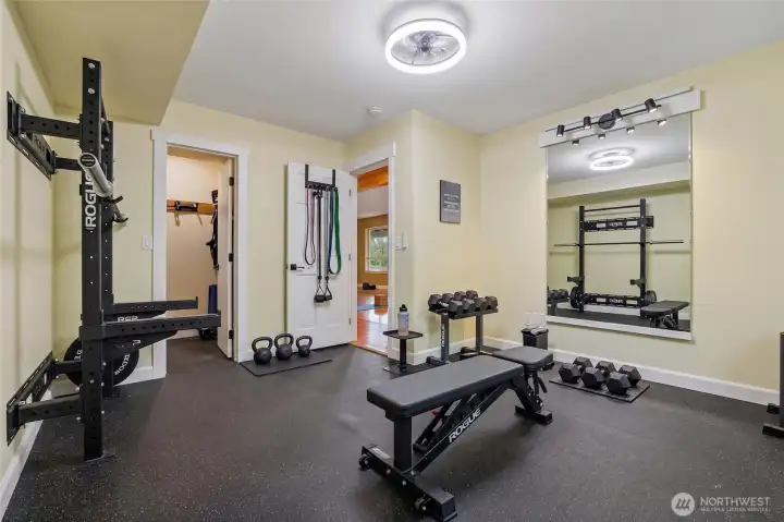 Virtually staged 4th bedroom or gym with walk-in closet
