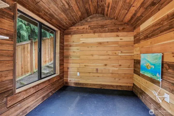 Fully finished and heated outbuilding for home office or crafting room.