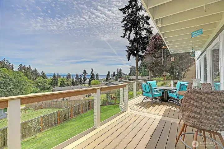 Expansive deck with beautiful water and cascade mountain views.