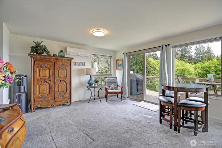 Enjoy seamless indoor/outdoor living with deck access.
