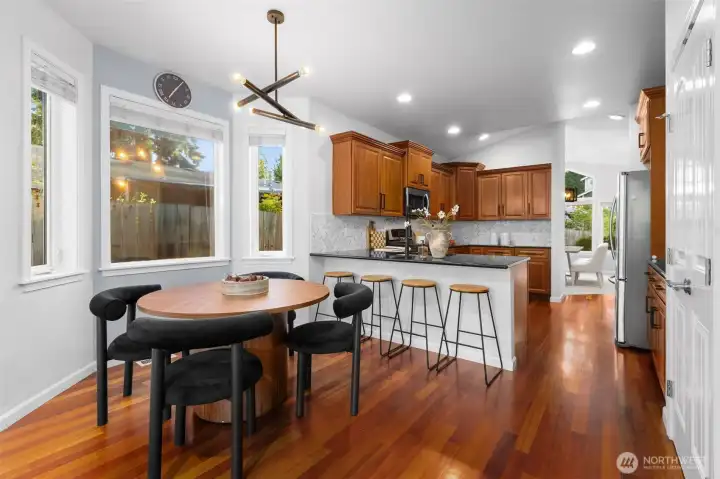 Kitchen nook with ample space and bar area