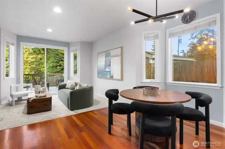 Dining nook flows into family room and onto a 3 tiered back deck
