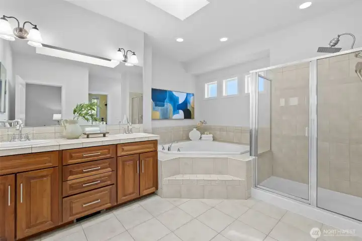 Airy and well-appointed primary en-suite bath