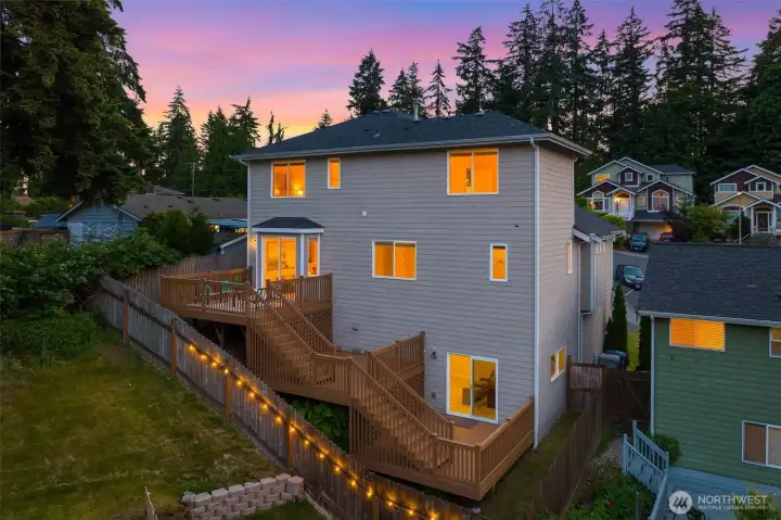 Low maintainence yard with three tier deck for outdoor living