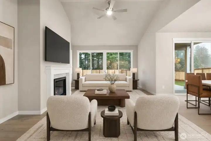 Living Room w/ gas fireplace and backyard views. Living Room w/ gas fireplace and backyard views.
