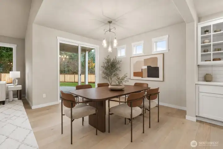 Dining Room w/ access to the back patio and fully fenced yard. Dining Room w/ access to the back patio and fully fenced yard.