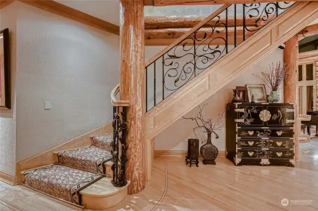 All birdseye Maple flooring and staircase.