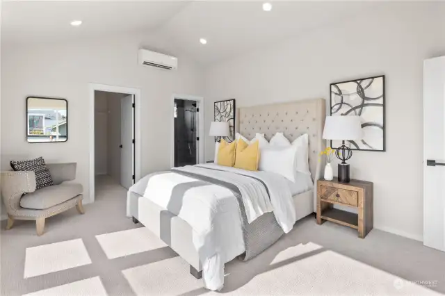 This serene master bedroom offers abundant natural light and direct access to a private balcony.