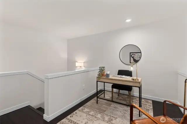 Loft area at the top of the stairs. Overlooks the living room.