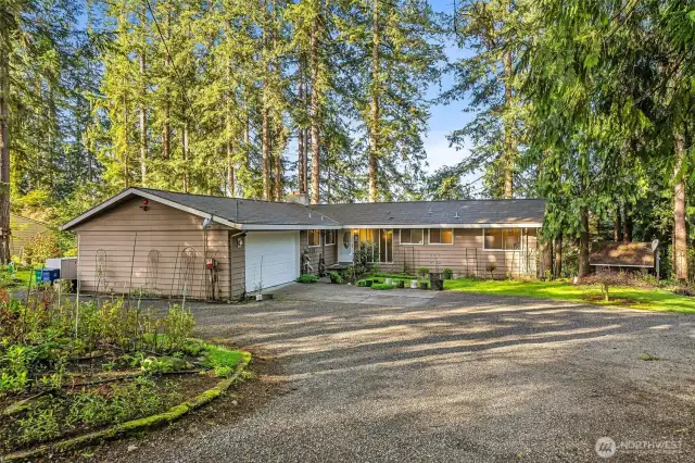 Home enjoys a circular driveway, cedar siding, composition roof, wired generator will run the entire home. Quietly located on a quiet dead end street.