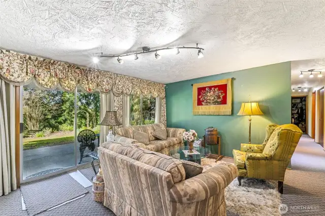 Lower-level family room with slider to patio.