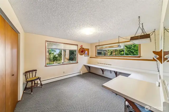 5th bedroom lends itself nicely to a craft room