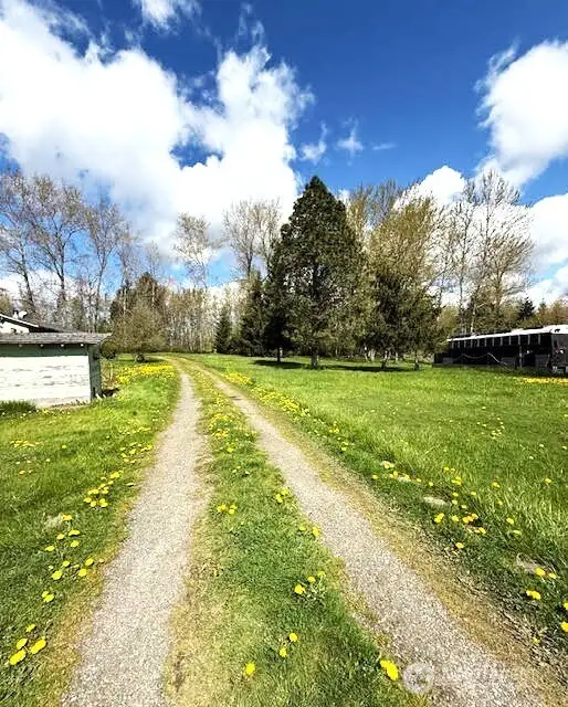 Westerly neighbor is the current owner of this lot.  They used driveway to access their shop.  They will no longer do so.