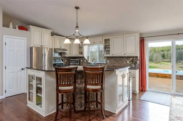 Custom hand-built wood cabinets with Western Maple faces and Oak drawer boxes.