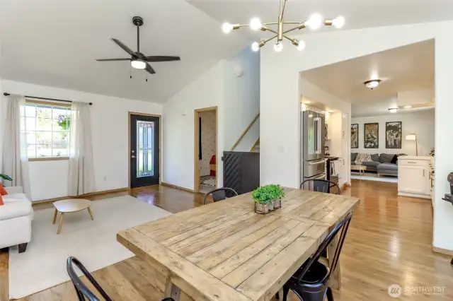 View looking toward front door and through kitchen