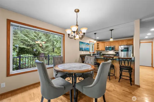 Lovely dining and kitchen area with a lot of natural light.
