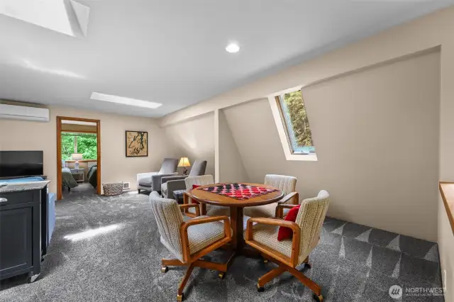 Playroom/family room/den is perfect for getting together to play games, read, watch TV, and hang out.