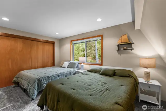 Large bedroom third bedroom with a lot of closet space.