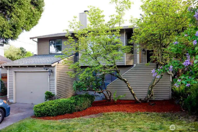 Gorgeous, secluded lot and immaculately maintained home. Single-car garage with two levels of living space, 3 bedrooms, and 2 full bathrooms.