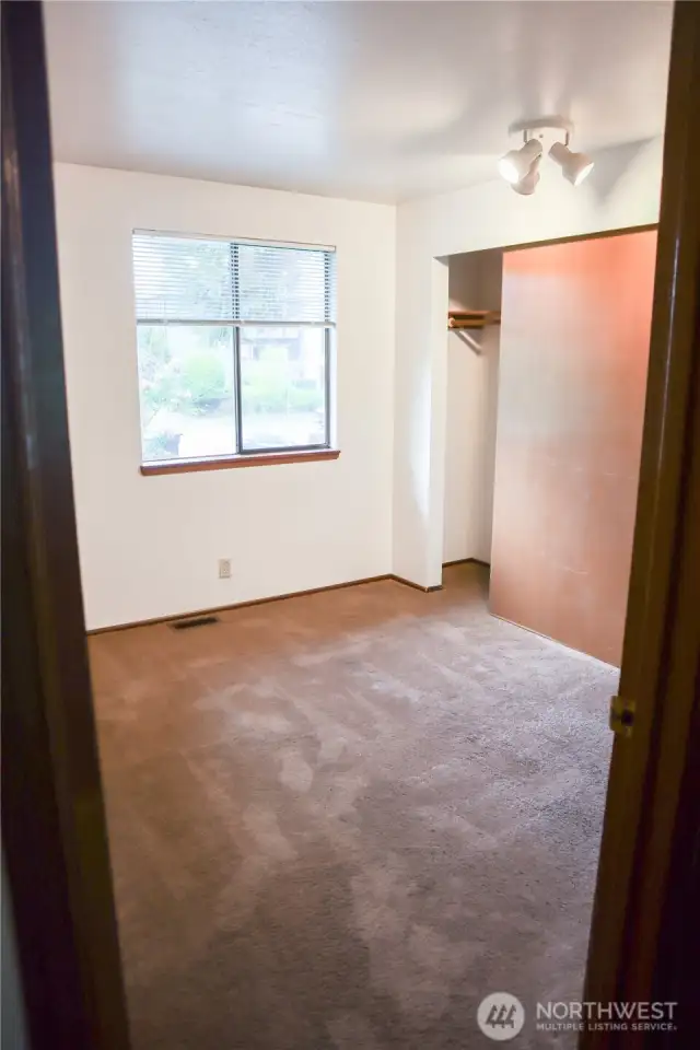 Secondary bedroom on main level.