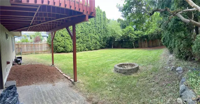 Here are some more shots of the backyard.  Looking back underneath deck with place for storage.