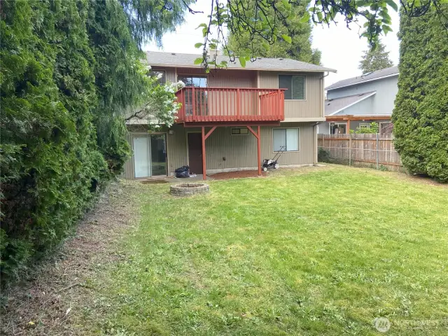 View from backyard towards house. ~6,000 square foot lot gives you a lot of options for the future.  Enjoy as a yard or explore the possibility of an ADU.