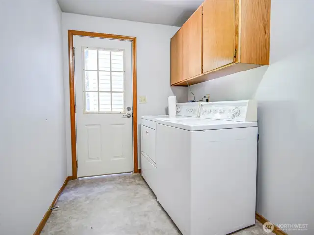 laundry with door to court yard
