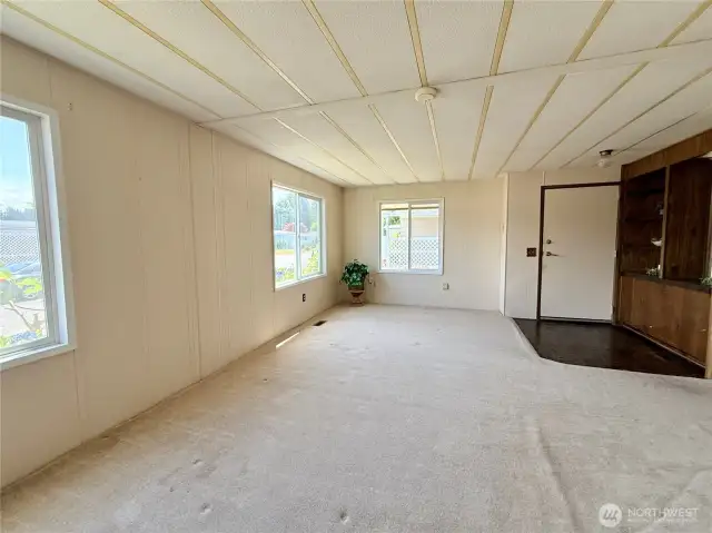 Another angle of the living room and front entrance.